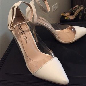 White and clear pumps